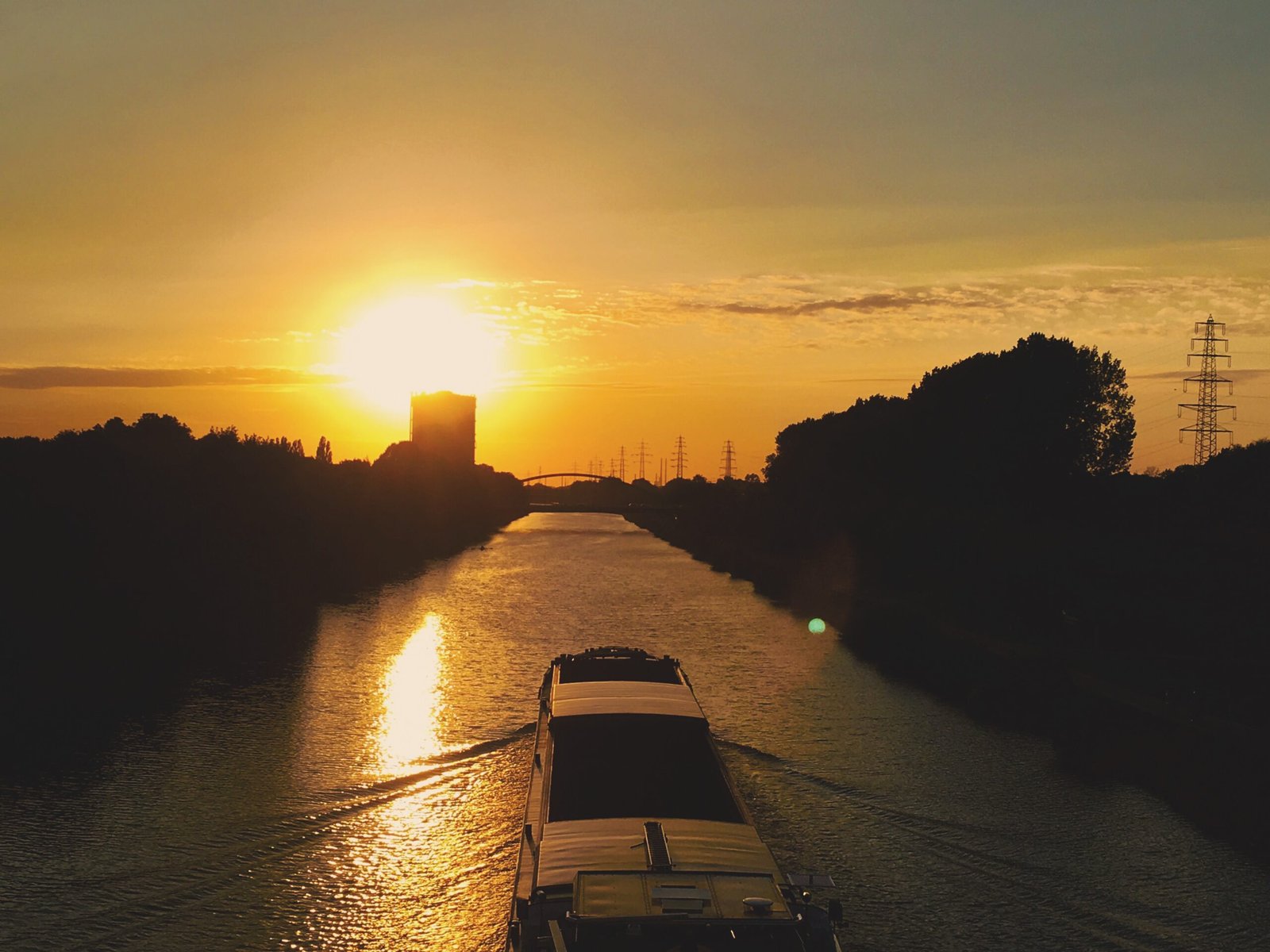 scenic-view-river-against-sky-sunset